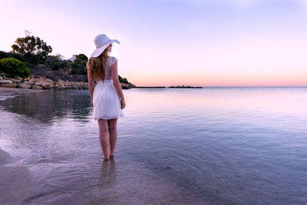 Кипр с 10 мая _Woman walking down the beach at sunset. Beautiful Sunset sea vie